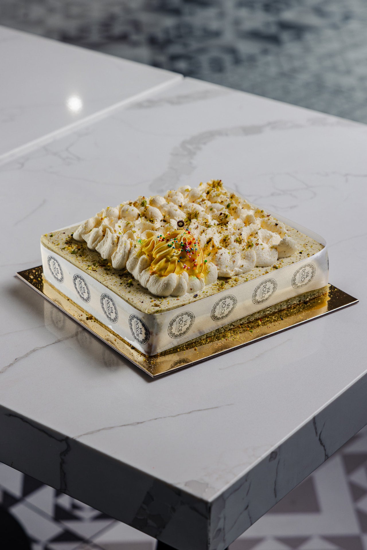 Pistachio mango mousse cake